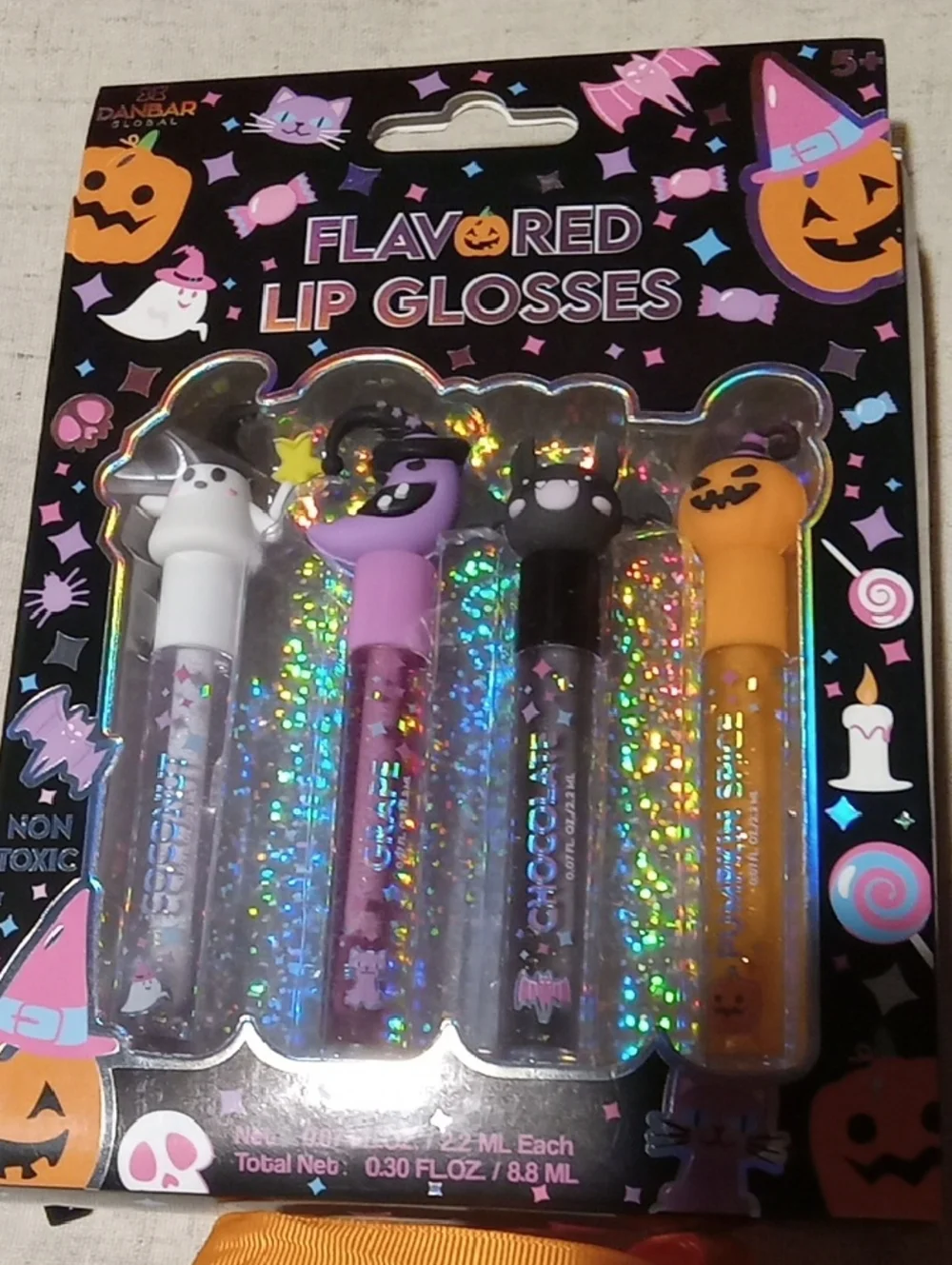 Flavored Lip Glosses Halloween Set – Pink, Black, Orange, White